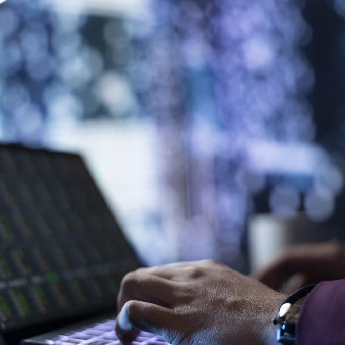 Analyst examines business records and financial resources to provide assistance to board members, working on increasing profit. Businessman investor follows stock market exchange trends. Close up.